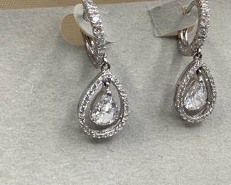 Many earrings in this auction