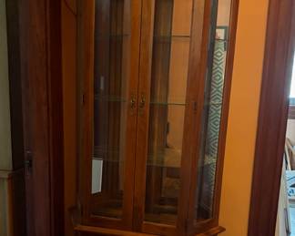 Walnut and Glass Lighted Curio Cabinet. Two levels
