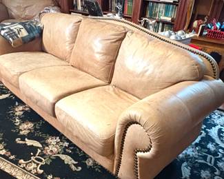 Leather Sofa and Black Floral Rug