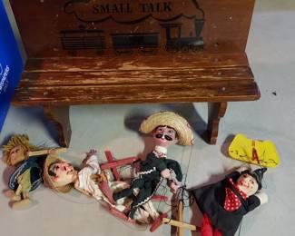Endearing child's/doll bench with various puppets