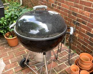 #92 Weber Charcoal Grill w/new Racks on wheels $75.00