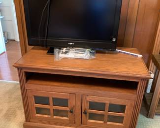 #85 Oak Entertainment Center w/2 doors w/glass w/1 shelf - 41xx22x27 $75.00