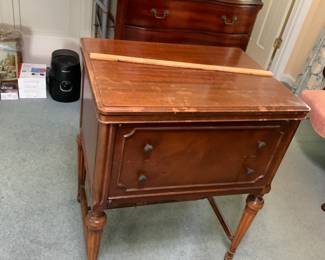 #57 White Sewing Machine in Cabinet $50.00