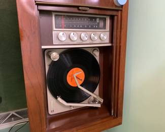 #37 Magnavox Stereo/Turntable Cabinet - (radio works, Turntable needle must be placed on the record) - 45x18x27 $75.00