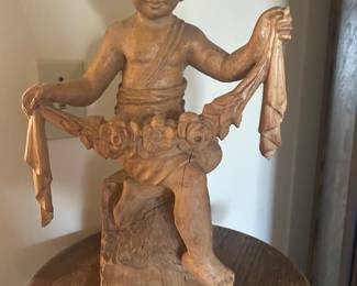 Carved wood cherub