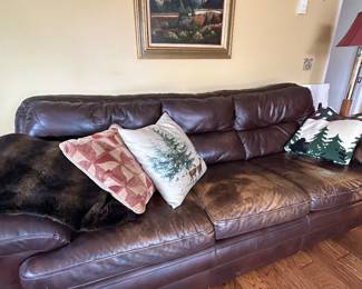 Vintage worn out leather sofa super comfy lots of life left.