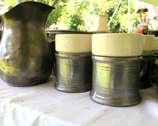Pewter pitcher, and mugs