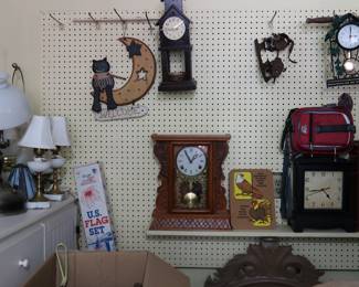Clocks, and clocks, with a cabinet