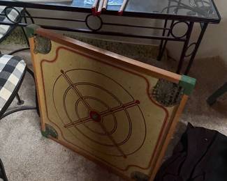 glass top table and 4 chairs and old game