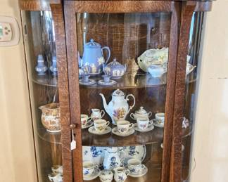 Antique curved front China cabinet