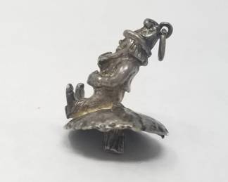 Silver leprechaun on a toadstool pendant