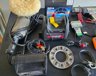 Automotive tools, battery chargers, buffer snow chains