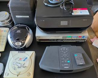 VCR, printer, 1950s 8mm projector, Bose stereo, Sega Dreamcast