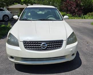 2006 Nissan Altima, approx 198k miles. Runs good