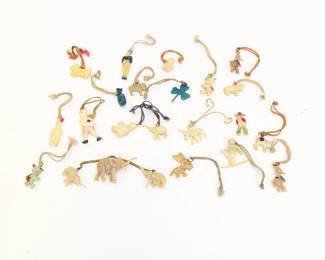 Lot #72 - 21 Celluloid Plastic Charm Pendant Cracker Jack, Including Pinocchio