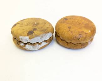 Lot #250 - Are they gun rests? Hacky sacks? Map weights?! Leather Riley Unidentified