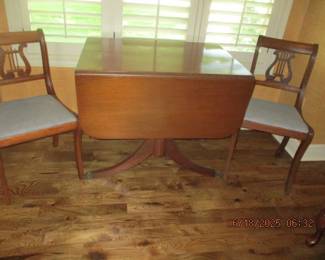Duncan Phyfe drop leaf table; two vintage harp style chairs