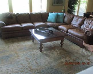 Leather sectional sofa and coffee table