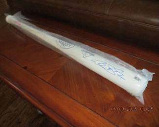 Baseball bat signed by Alex Gordon