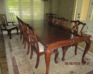 Stoneleigh Dining room table with 8 chairs and two 24" leaves and pads