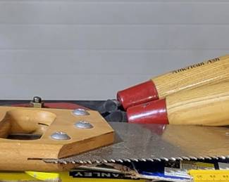 Saws....top shelf isn't the "best" location for these sorts of things, we're still sorting and staging. We'll find a better location before we see you Friday.