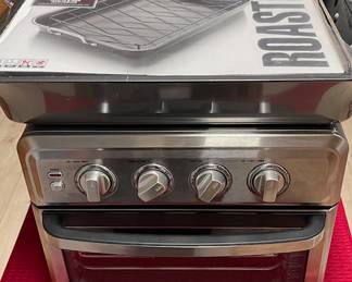 New in wrapping Roating pan. Cuisinart all in one portable oven.