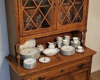 China cabinet. Wedgewood china. Crystal stemware. gorgeous serving glass ware