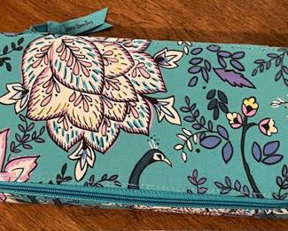 Vera Bradley pill case. It was in plastic and looks like its never been used.