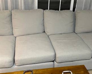 Large, long, gray toned sectional sofa (2 pieces, connects in middle). Comfy. Looks like a great nap waiting to happen. You know Father's Day in Sunday, June 15th...has the Dad in your life been wanting a longer couch to nap on? We got you.