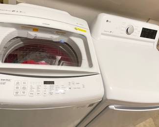 LG Washer and Dryer (electric). Model is 5 years old, but this set was bought 2 years ago off the showroom floor. STILL under manufacturer's warranty. They work great (we've completed 2 loads to ensure functionality). There is a small indent on the left hand side of the dryer on the front.