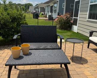 Outdoor patio set loveseat, two chairs, and a table