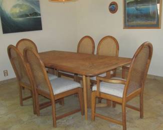 Oak dining table with one leaf and six chairs, nice condition.