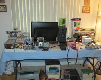Electronics, cameras, CD's, vinyl.