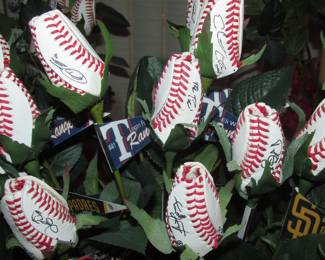 These roses are made of official MLB rawhide and individually signed by the professional players! One of a kind!