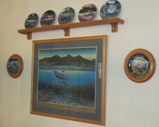 Collectible plates and hand-signed artwork.