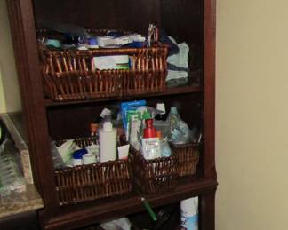 more bathroom supplies and storage baskets