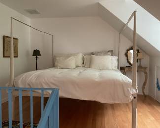 King bed with white frame. There are two identical beds and frames like this one at this sale.
