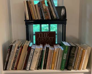 Nice selection of cook books. Small display shelf featured is also for sale.