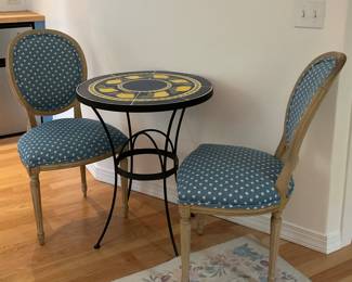 Two charming blue polka dot chairs. These chairs match a second set, with different frames.