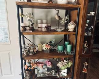 Shelving unit with figurines, vases, various decorative pieces