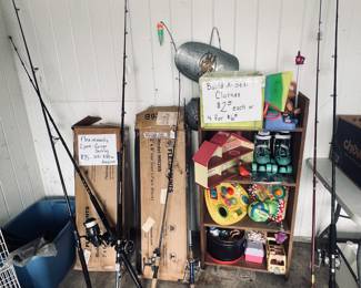 Fishing rods including Penn Defiance, Garcia Mitchell, Penn Pier and Abu Garcia.