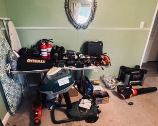 Power tools including DeWalt, Craftsman, Worx and a generator.