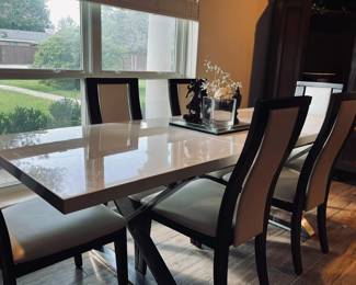 Formal dining room table and 6 chairs.