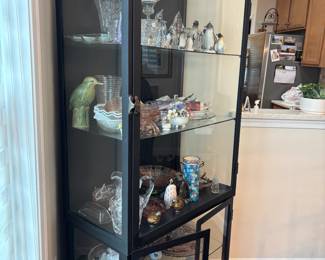 Curio cabinet with collectibles