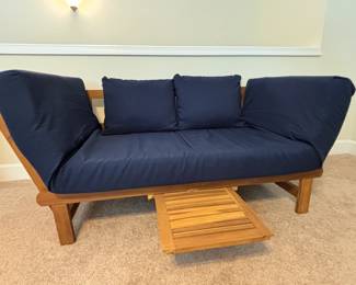 Unique futon with extendable table