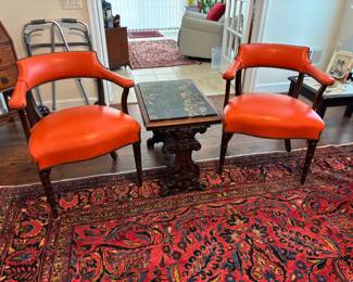 Vintage orange leather side chairs