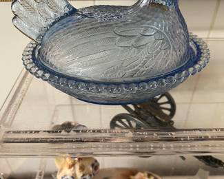 Blue glass covered chicken 