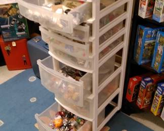 Large storage chest filled with smalls, miniatures and collectible items.