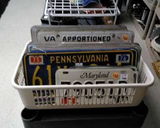 Assorted license plates from various states.