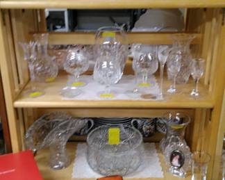Large assortment of Waterford and other signed crystal items.